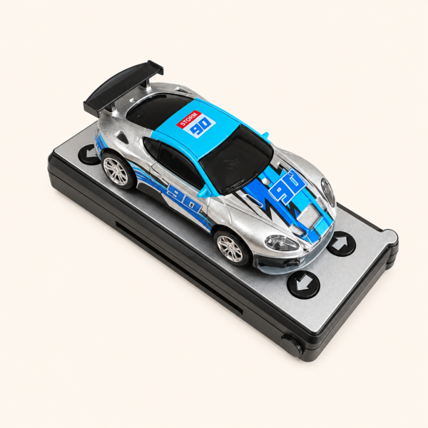 RC003_5 Blue and silver mini RC race car on its charging base