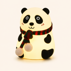 Panda silicone night light glowing warm white on a desk