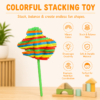 A007 3 The stacking fidget flower on a table, showing its stacked coloured discs