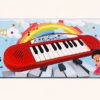 A033 1 Red toy musical piano keyboard with rainbow artwork on the pack